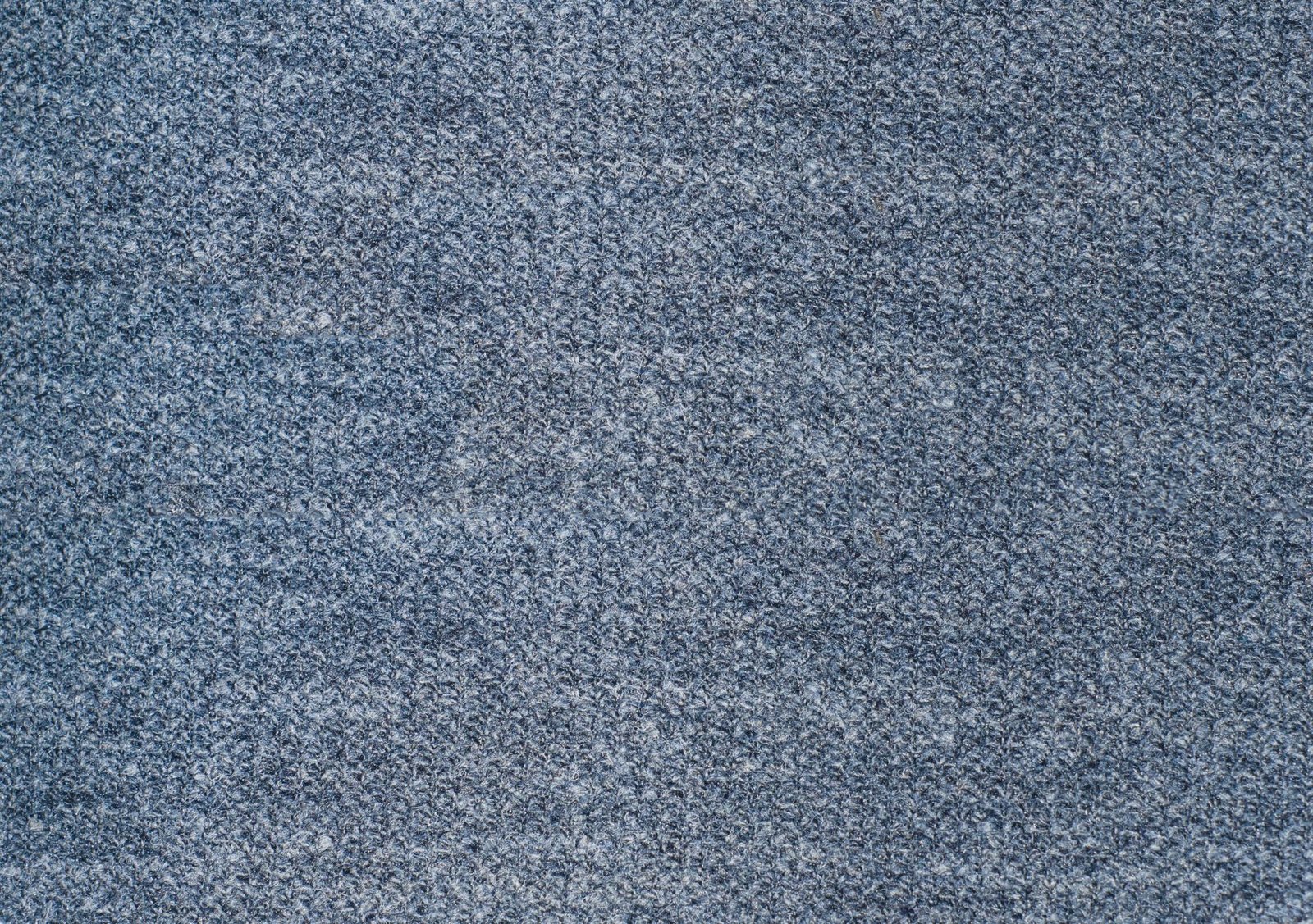 Close-up of soft draped fabric texture in warm light
