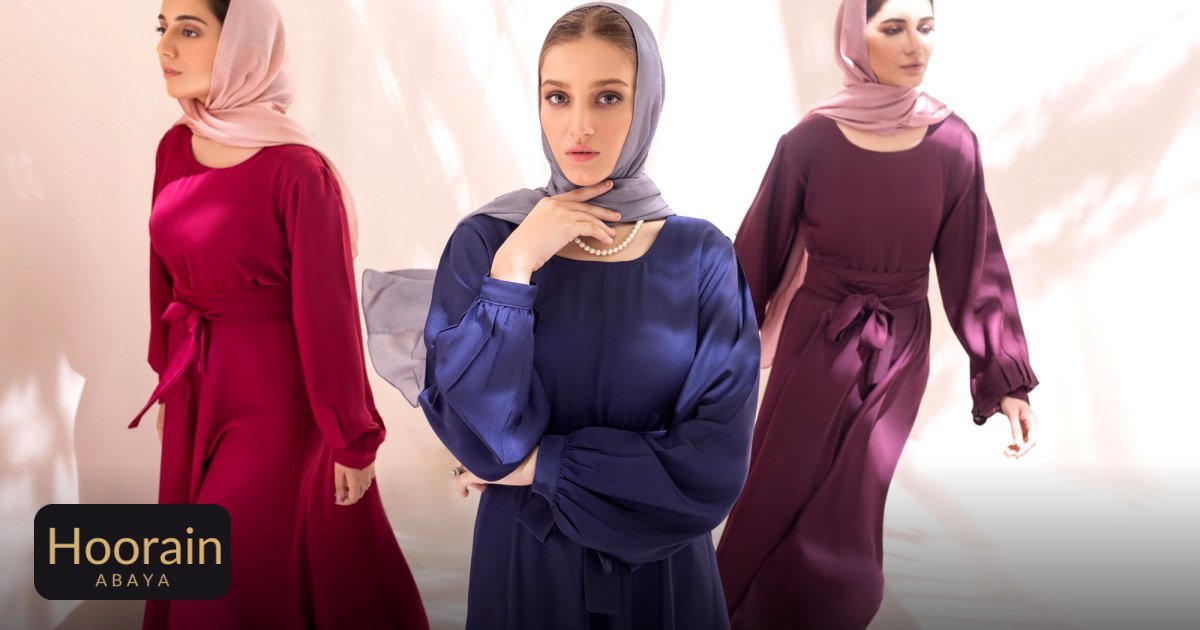 Abaya for Body Shape: How to Choose Yours - three stylish women in elegant hijabs pose in natural light